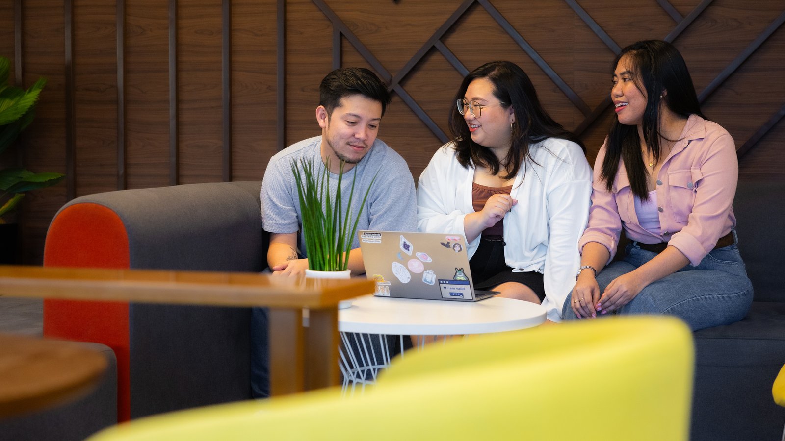 a group of people sitting around a table