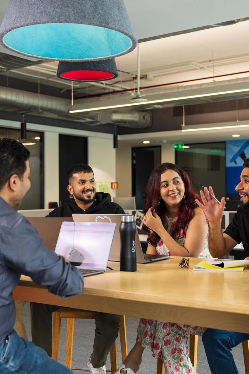 a group of people sitting around a table