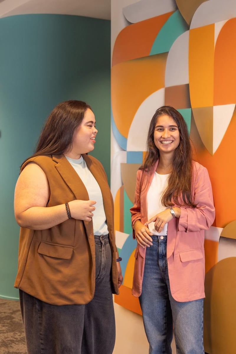 two women standing next to each other