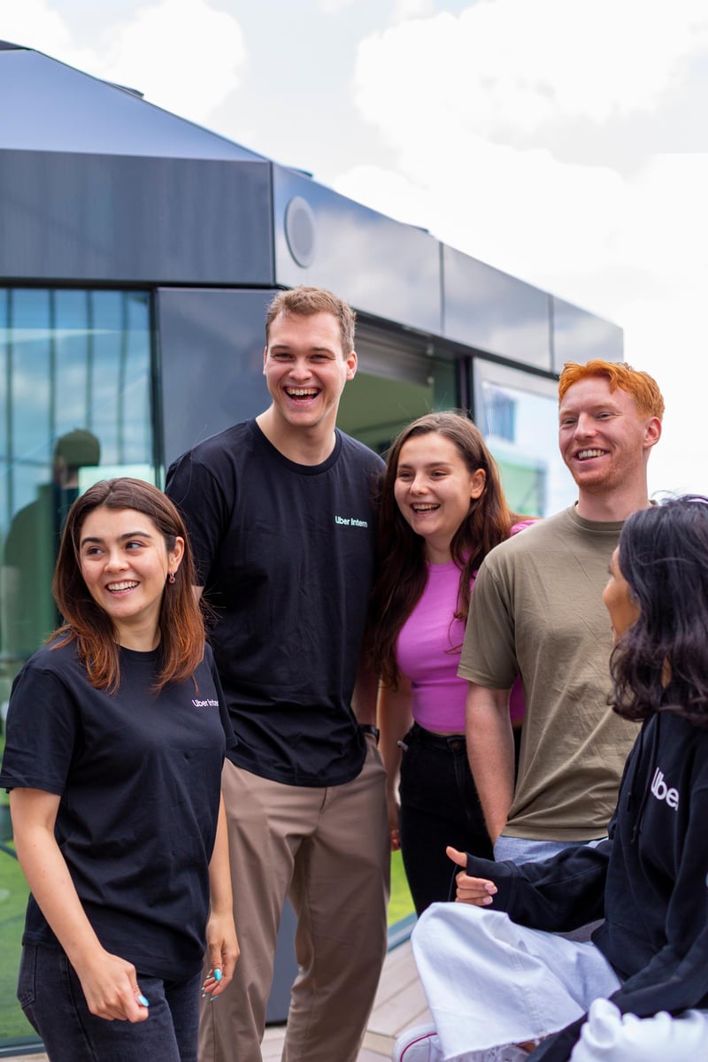 a group of people standing together outside a building