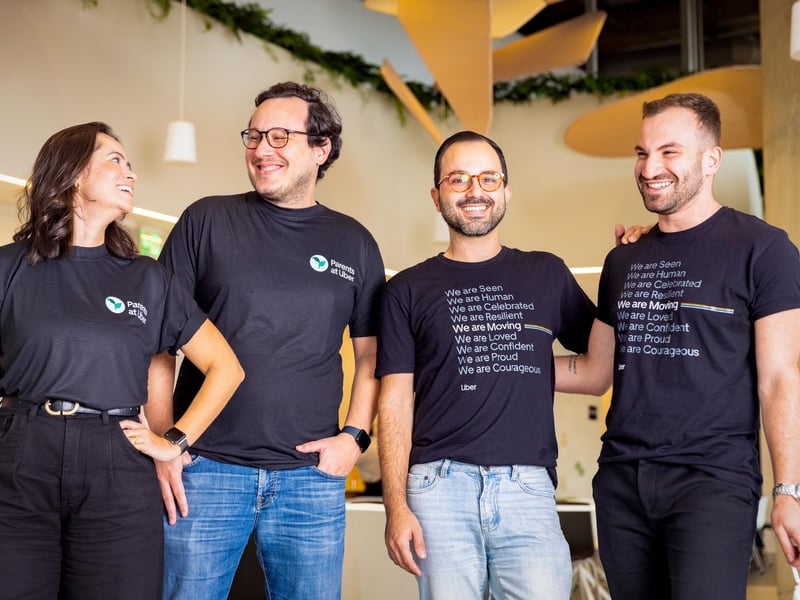 a group of people wearing black shirts