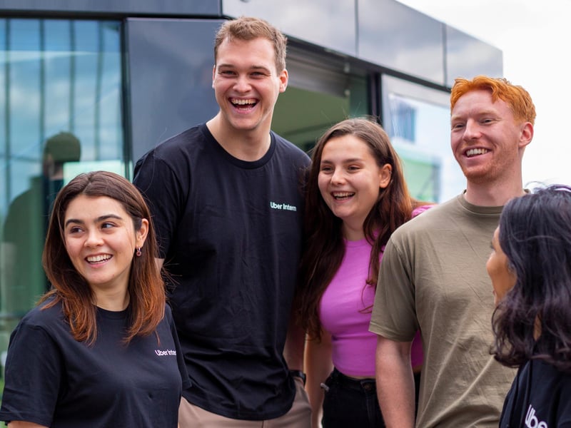 a group of people standing together outside a building