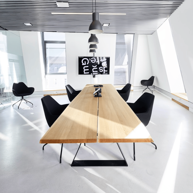 a room with a table and chairs