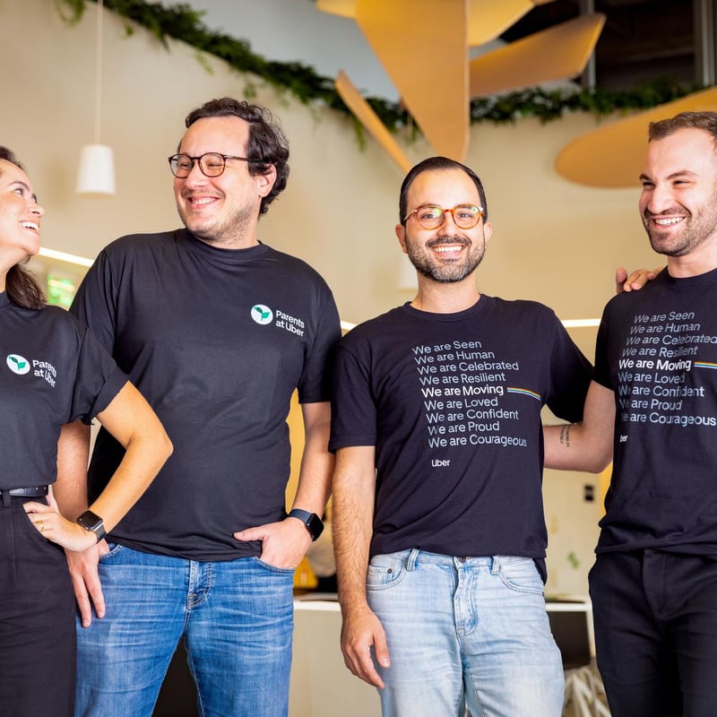 a group of people wearing black shirts