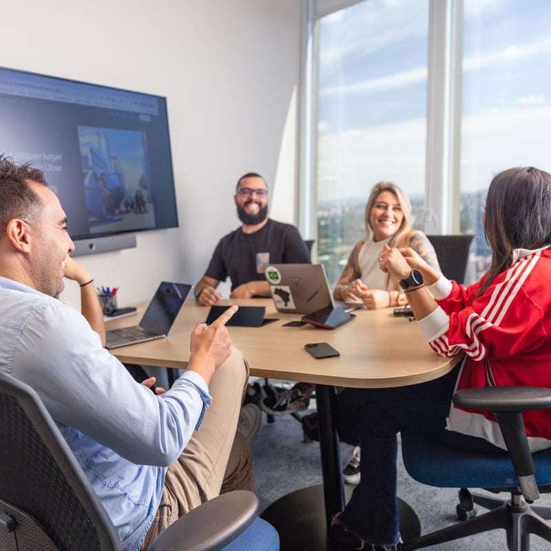 a group of people sitting around a table