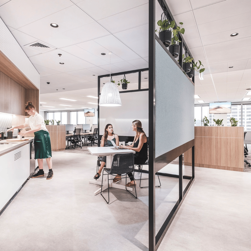 a group of people in an office