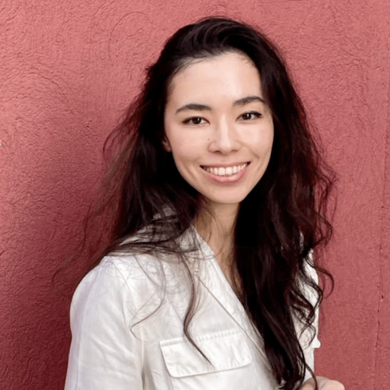 a person smiling at camera