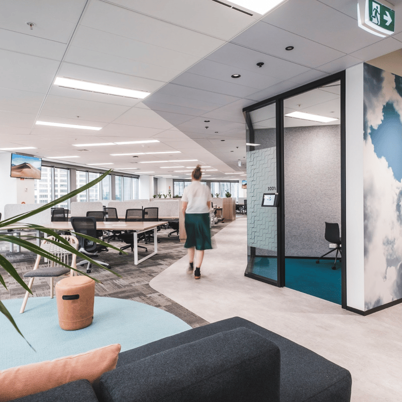 a person walking in an office