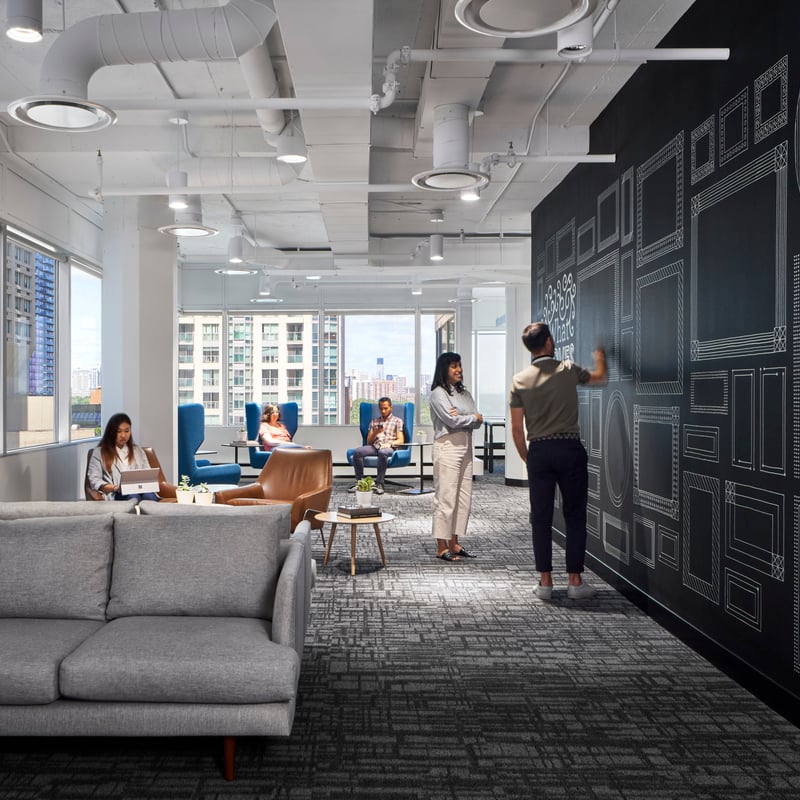 a group of people in an office