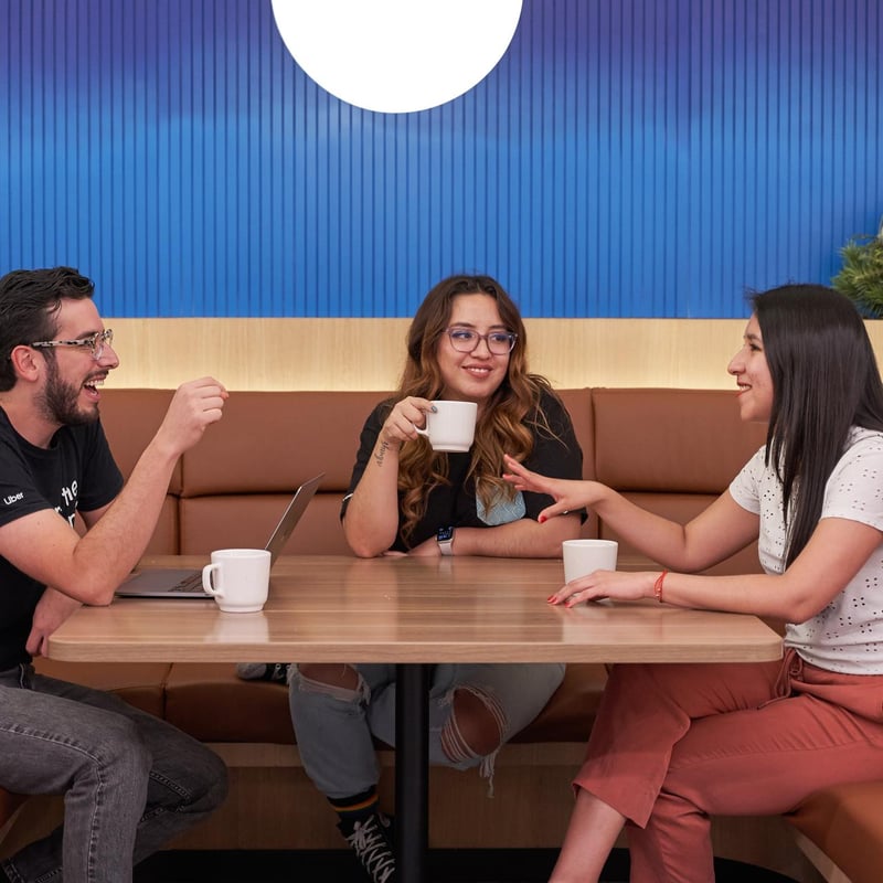a group of people sitting at a table