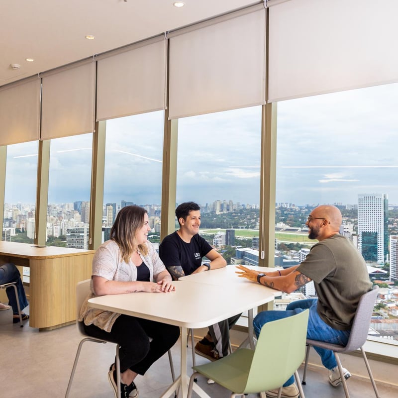 a group of people sitting at a table