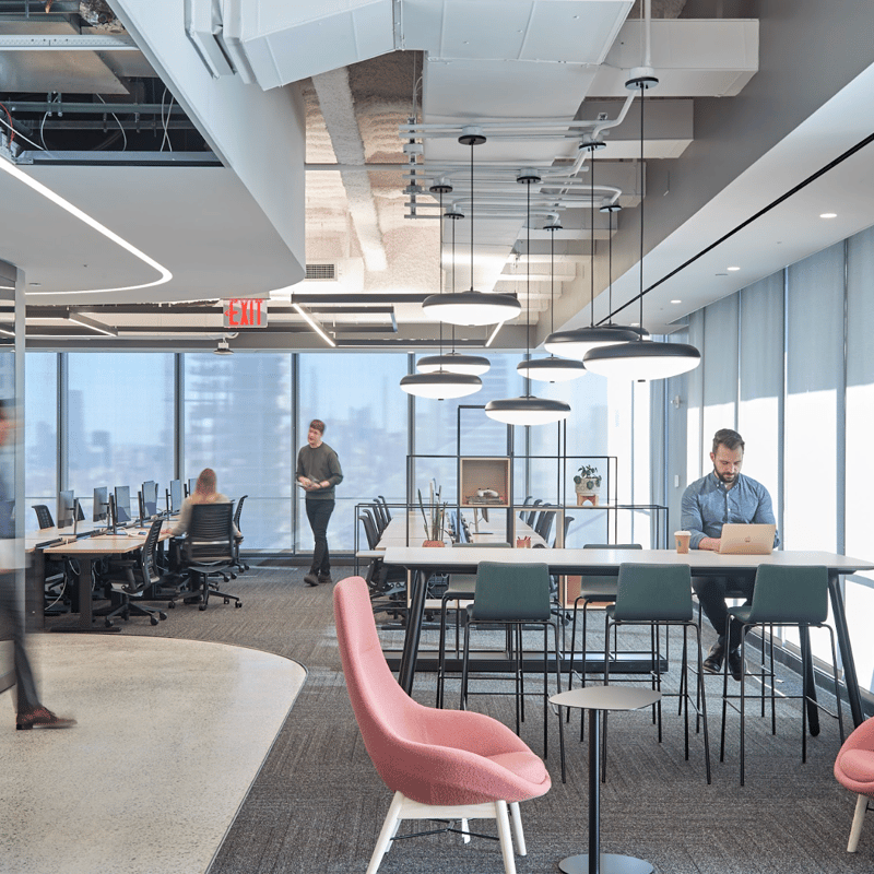 a group of people in an office