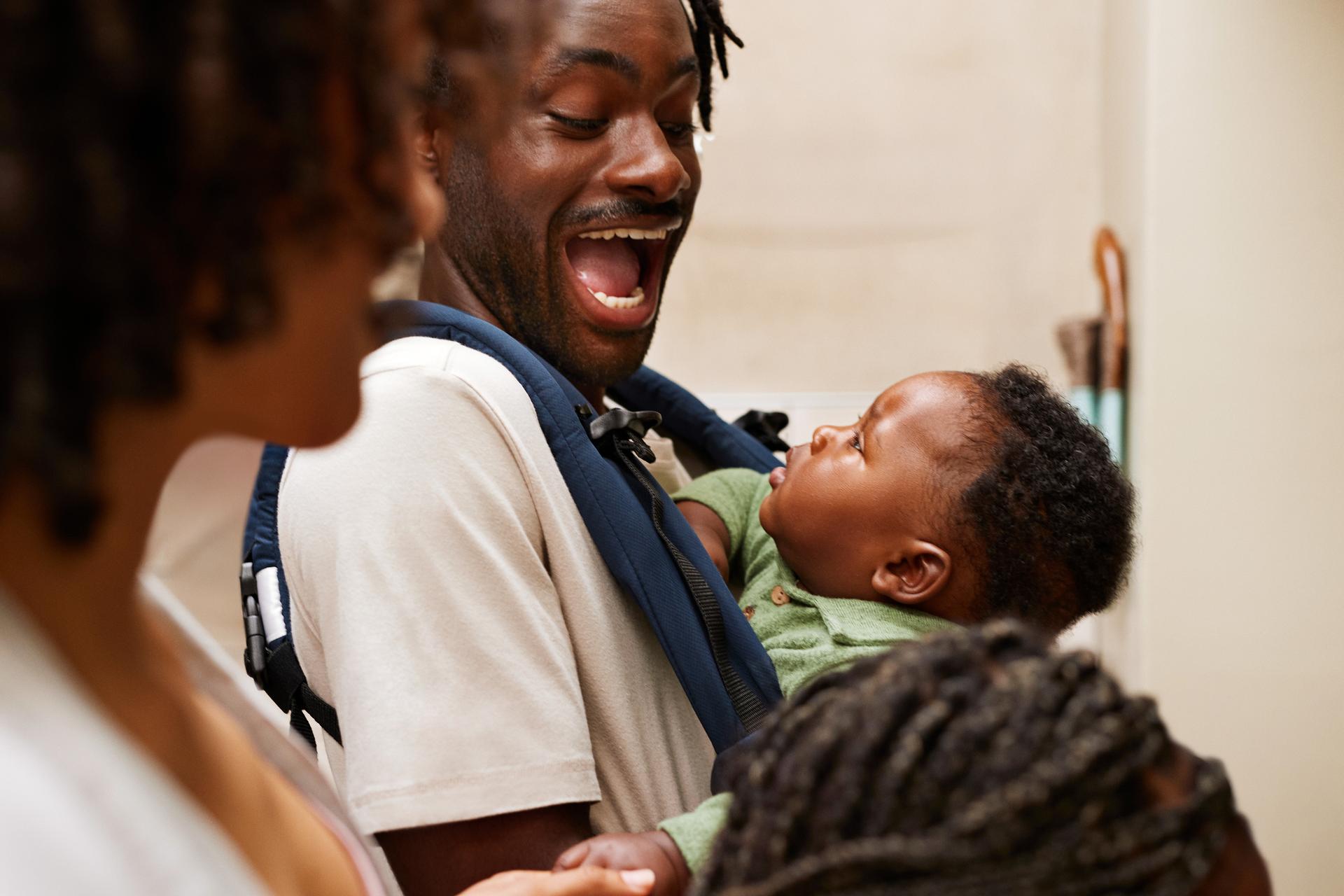 a person holding a baby