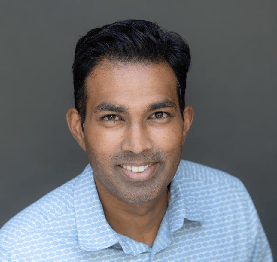 a person smiling at the camera