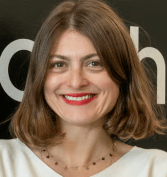 a person smiling at the camera