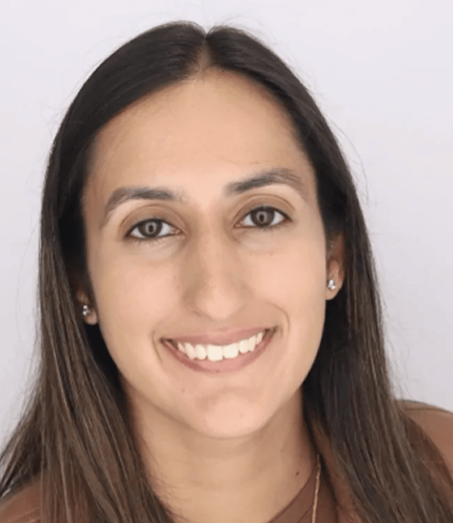 a person smiling at the camera