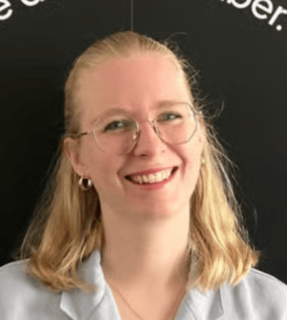 a person smiling at the camera