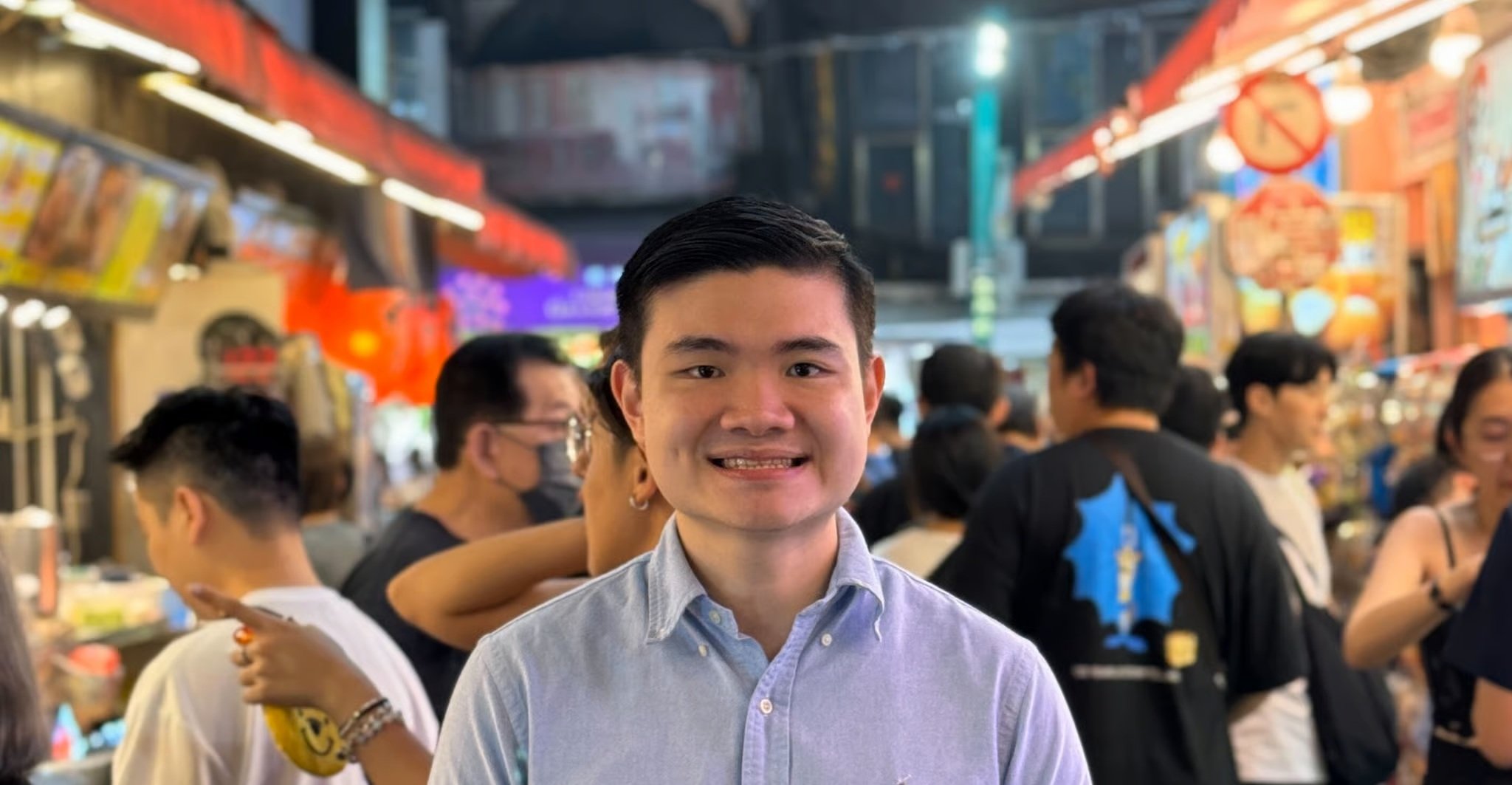 a person smiling at the camera