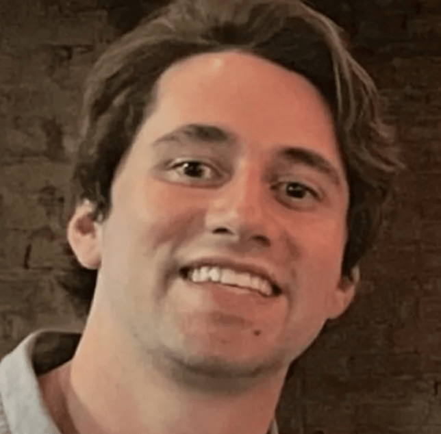 a person smiling at the camera