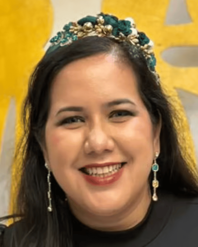 a person smiling for the camera