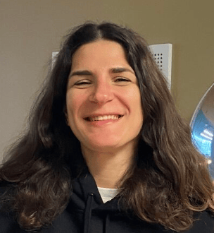 a person smiling for the camera