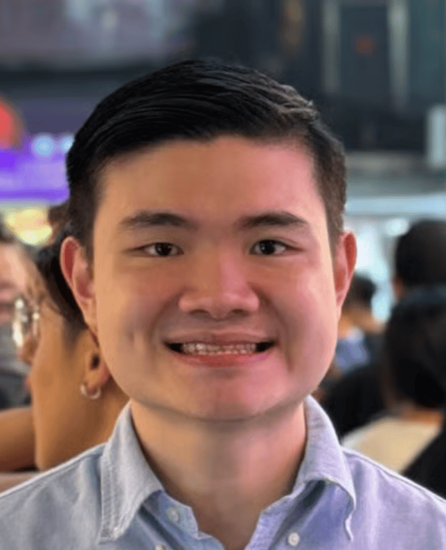 a person smiling at the camera
